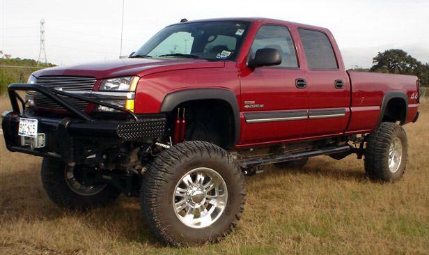 Red Chevy 4x4 truck with Driveshaft Specialist driveshafts
